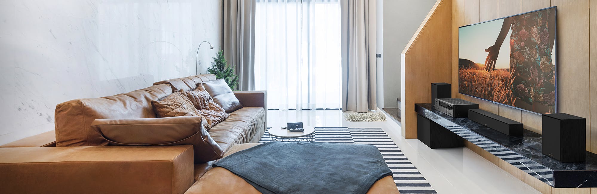 Onkyo Receiver in Airy Living Room with Klipsch Home Theater System2 2000x650