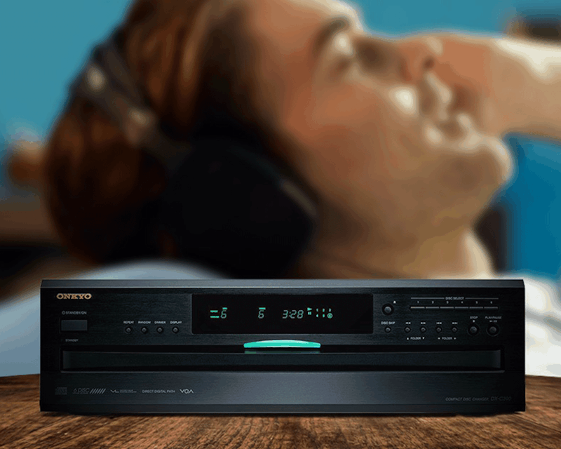Person Relaxing Listening to Music on Onkyo DXC390 2000x1333