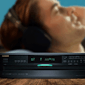 Person Relaxing Listening to Music on Onkyo DXC390 2000x2000